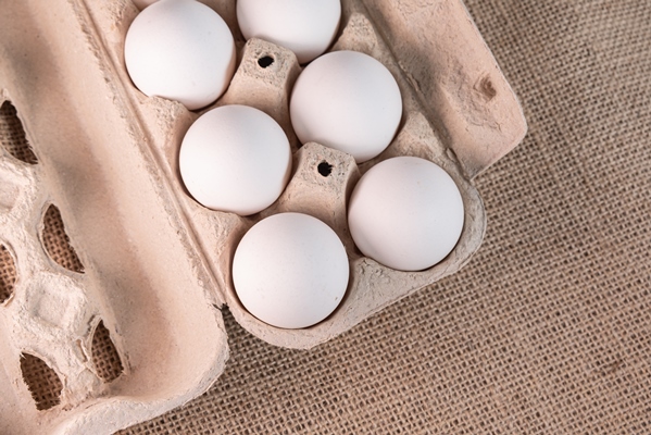 eggs on the brown background - Творожная запеканка в мультиварке