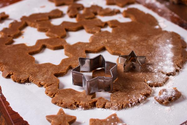 high angle christmas cookie dough with star shapes - Пряники шоколадные