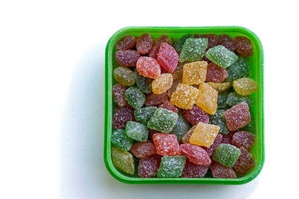 multicolored sucking lollipops of montpensier in a box isolated on a white background - Хозяйке на заметку: словарь кондитера