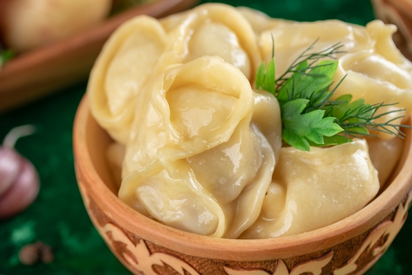 oriental national traditional dumplings manty - Манты с рыбой и тыквой