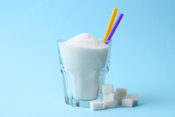 refined sugar glass colored background diabetes concept excess sugar - Шарлотка простая