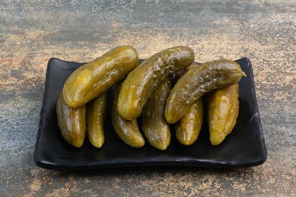 dark plate full delicious pickled cucumbers white background high quality photo - Рассольник с шампиньонами