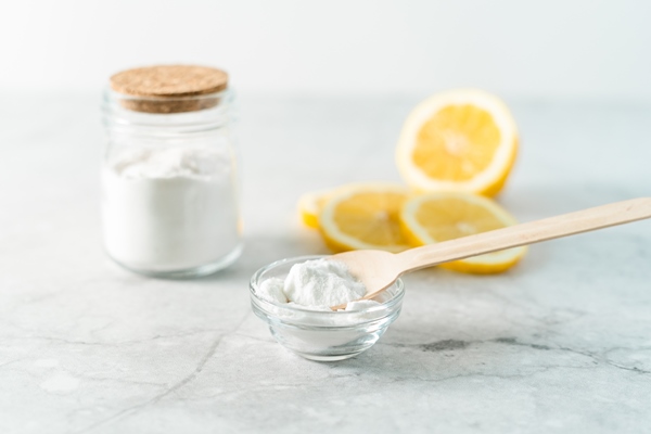 eco friendly natural cleaners jar with baking soda lemon wooden spoon marble table background - Пирожное "Наполеон"