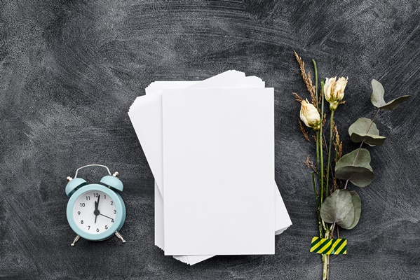 fashionable stationery background black notepad stickers alarm clock flowers - Как поминать усопших