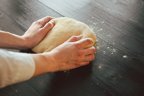 hands knead dough - Постные пирожки на маргарине