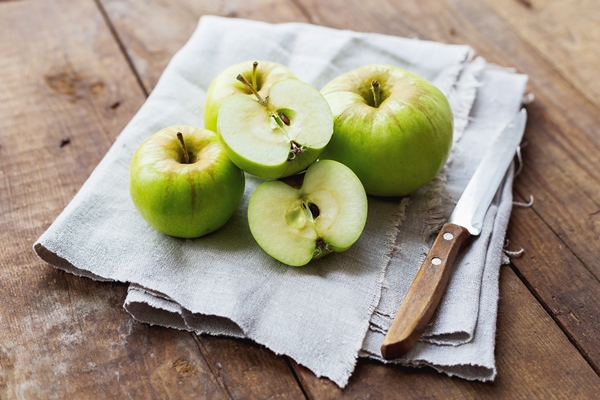 healthy snack background green apples rustic wood - Форшмак для блинчиков