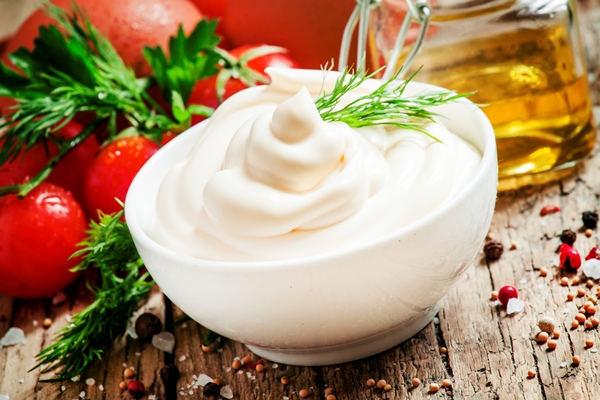 homemade mayonnaise with chicken eggs mustard oil selective focus - Запеканка из сыра и лука