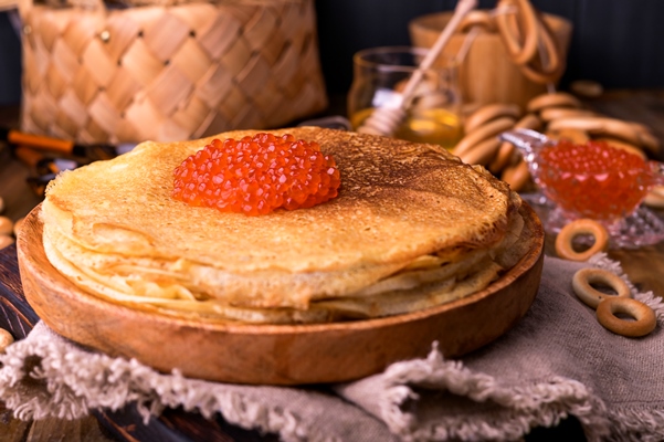 shrovetide maslenitsa week festival meal stack russian pancakes with red caviar rustic style free space - Блины, блинцы, блинчики!