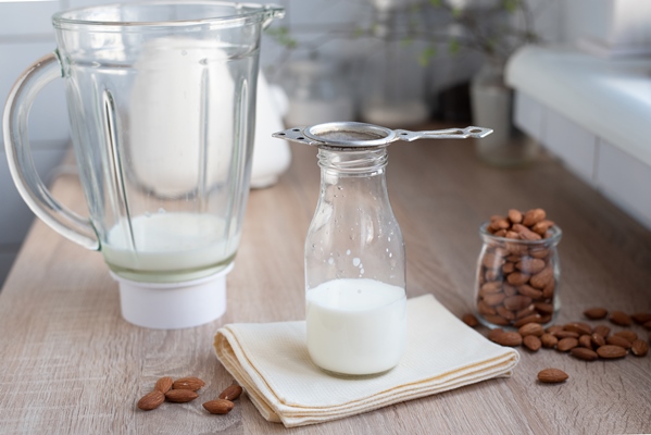 almond milk bottle with blender table kitchen - Миндальная сгущёнка