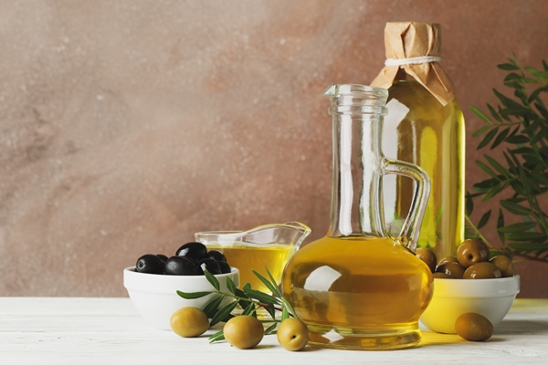 composition with olive oil olives against brown space - Овощной паштет с икрой