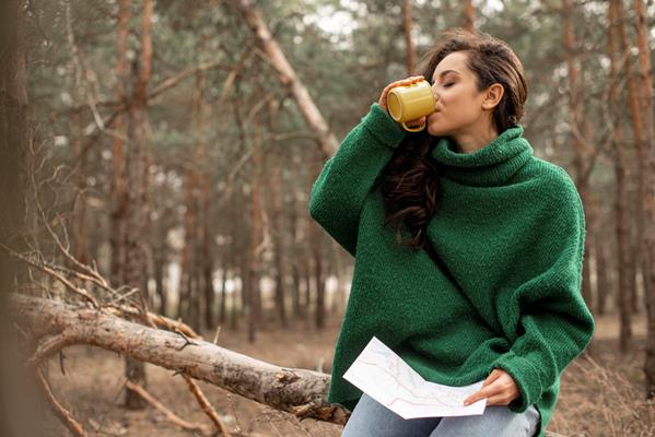 high angle woman drinking tea - Правила и сроки сбора берёзового сока