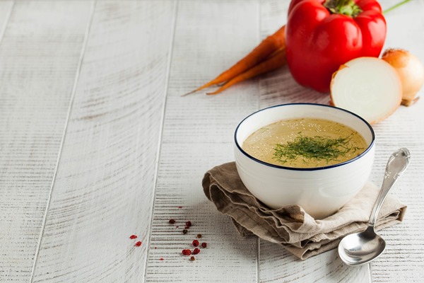 homemade broth white bowl napkin with dill fresh vegetables wooden background concept healthy eating copy space - Суп с киноа