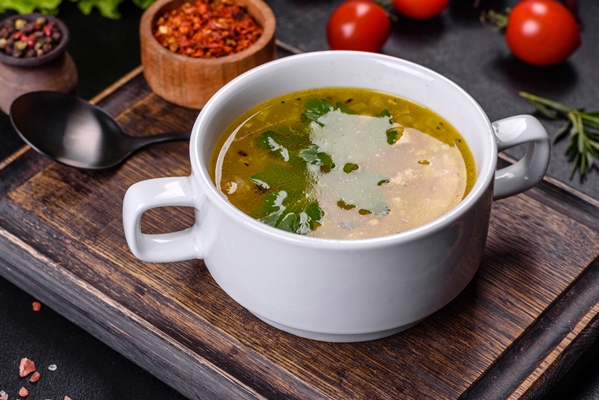 hot tasty healthy soup with fish vegetables served round plate - Простая уха из рыбной икры