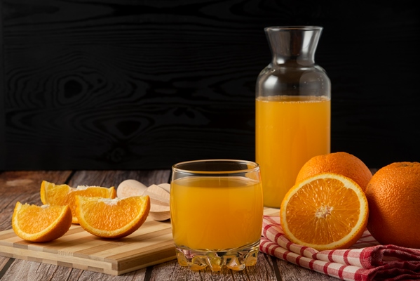 sliced oranges with juice glass jar cup - Фануропита