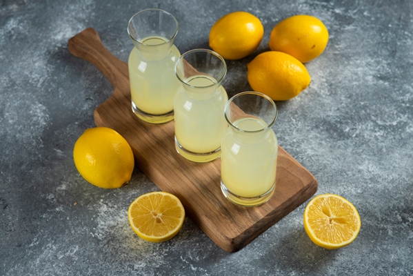 three glass jugs cold lemonade wooden board - Овощной паштет с икрой