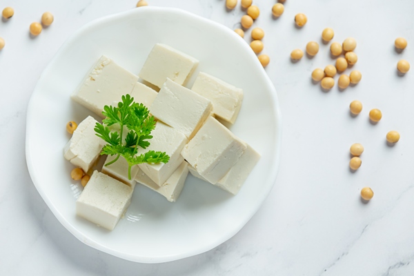 tofu made from soybeans food nutrition concept - Фаршированные перцы с киноа