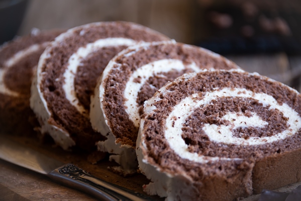 delicious chocolate roll cake with white cream homemade baked dessert - Соевый рулет с творожной начинкой