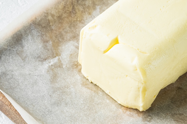 fresh butter package white background with copy space - Ореховая помадка на сухом молоке