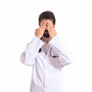 doctor covering his eyes isolated white background 1368 5799 - 7 факторов, снижающих иммунитет